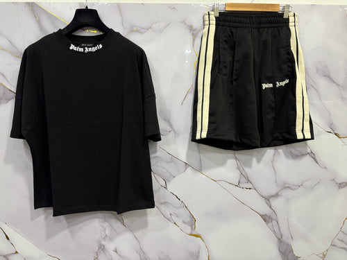 Image of COMPLETO PALM t-shirt and shorts duo in black featuring Palm Angels branding.