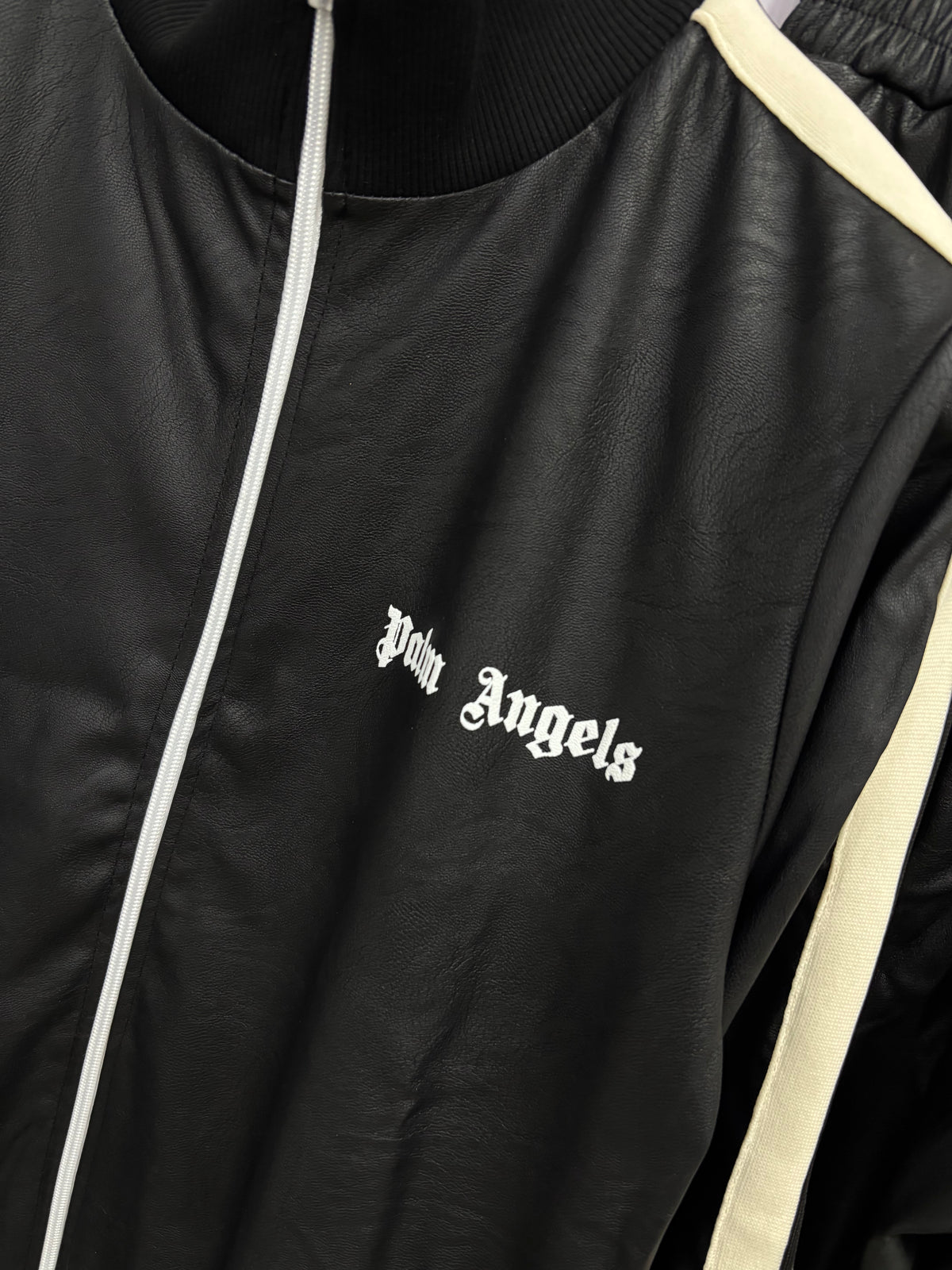 TUTA DI PELLE PALM ANGELS