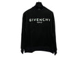 FELPA GIVENCHY CLASSIC displayed on a hanger against a marble background, featuring bold Givenchy Paris logo.