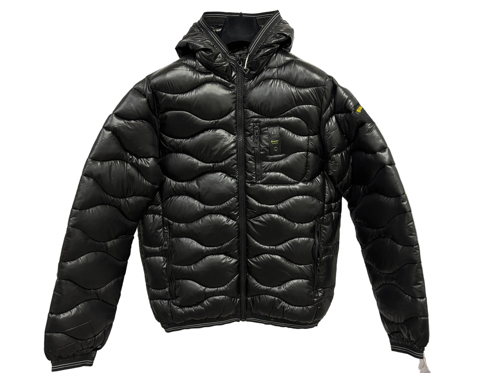 GIUBBINO BLAUER black puffer jacket with hood on a marble background.